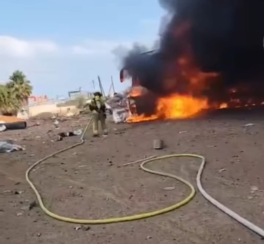 זירת הנפילה, כיבוי שריפה בחניון אוטובוסים