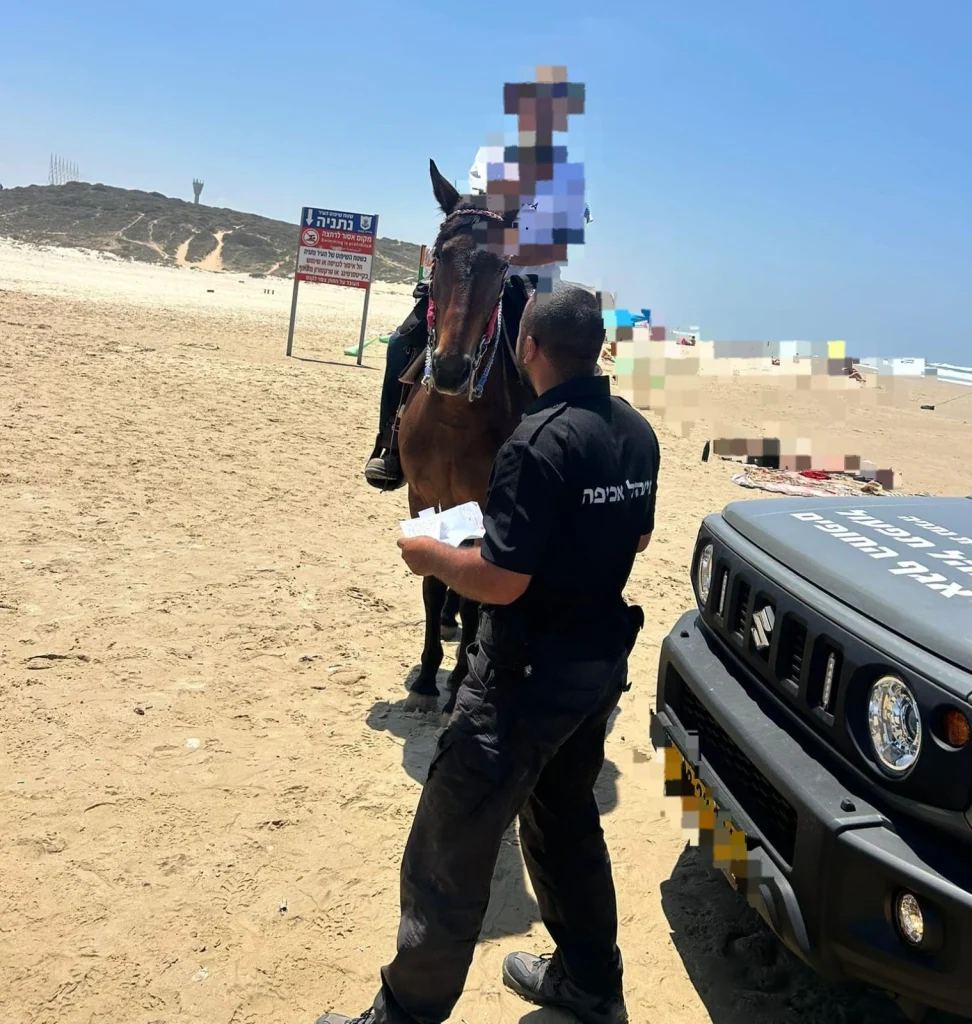 צילום עצירת רוכב סוס על החוף